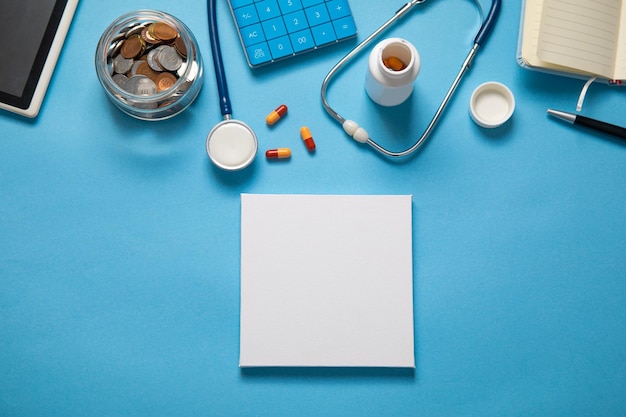 Jar of coins stethoscope calculator pills Empty space for your text