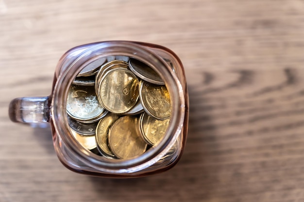 Jar filled with saved coins from above