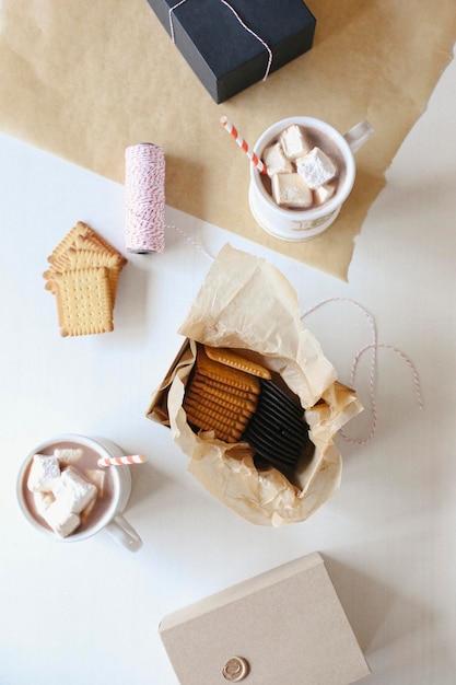 A jar of homemade marshmallows and sweet biscuits