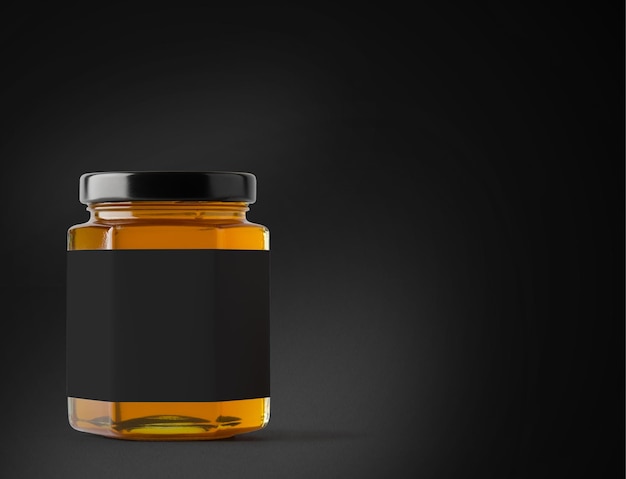 Jar of honey with label on a black background