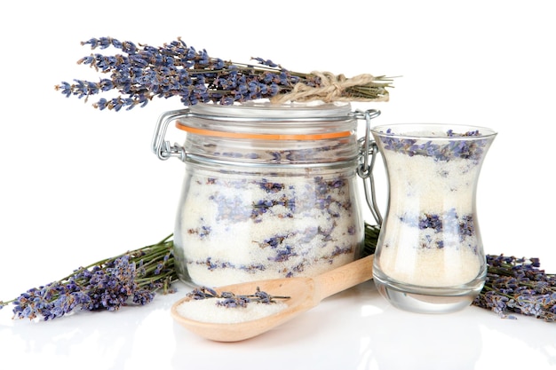 Jar of lavender sugar and fresh lavender flowers isolated on white