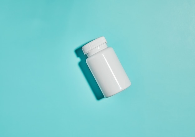 Jar mockup on light blue background with hard shadow.