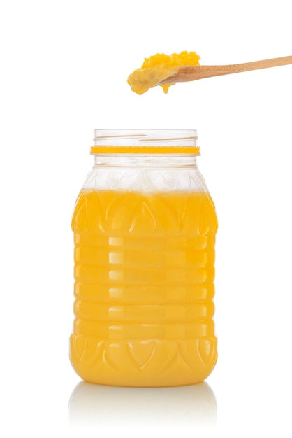 Photo jar of pure indian ghee with spoon