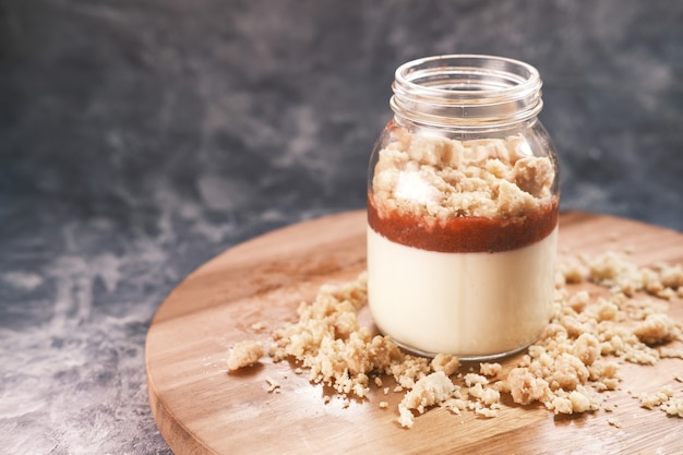 A jar of strawberry cheese cakes parfait