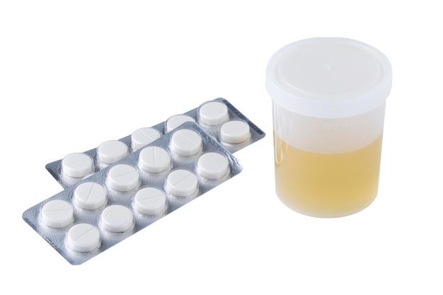 Photo jar of urine and pills