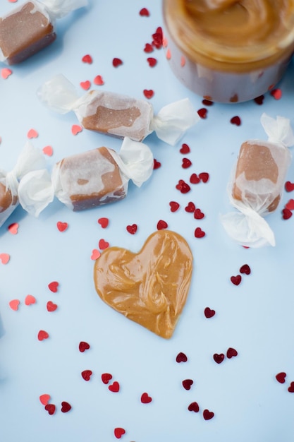 Jar with caramel and caramel candy