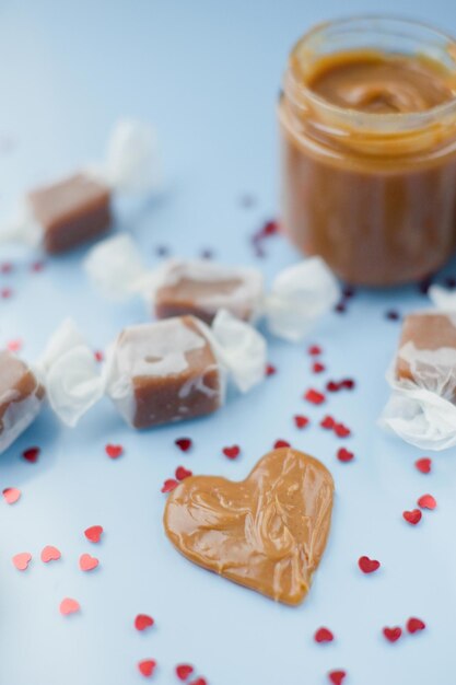 Jar with caramel and caramel candy