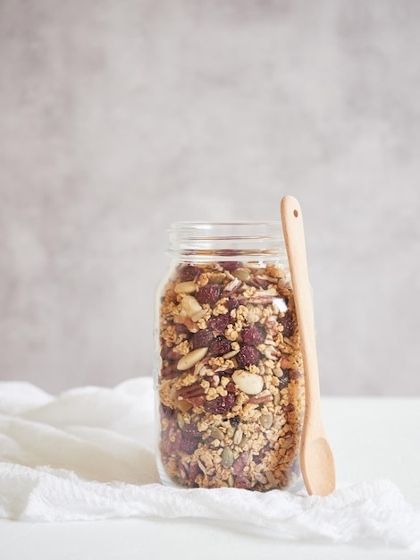 Jar with granola on table
