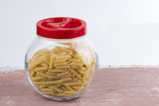 Jar with pasta, food storage