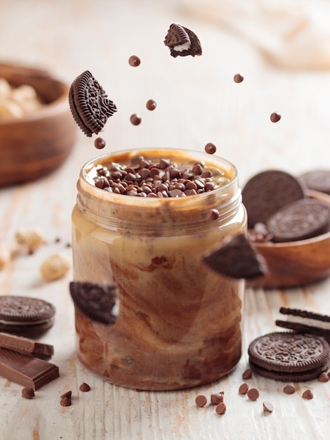Jar with peanut butter and sweet ingredients