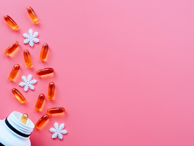 Jar with pills and Christmas decorations