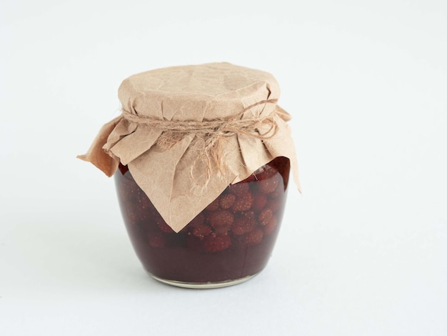 Jar with strawberry homemade jam Winter preservation preparations