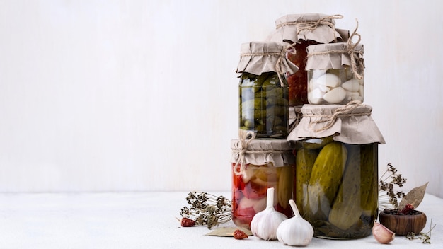 Jars assortment with picked vegetables