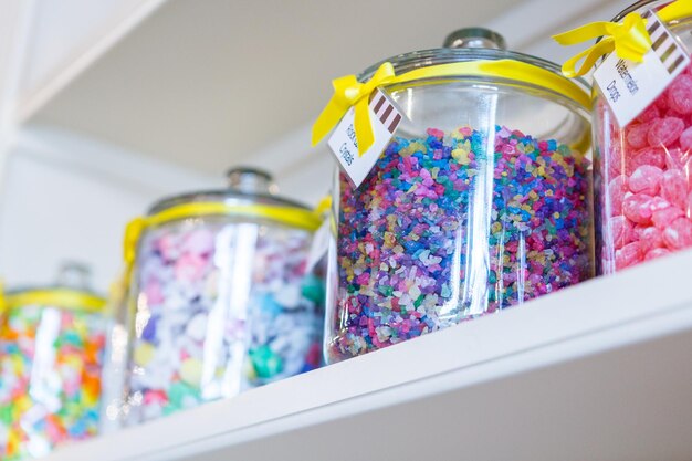 Photo jars filled with different candies at the boutique candy store.