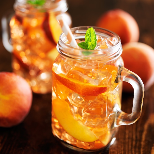 Jars filled with sweet peach tea