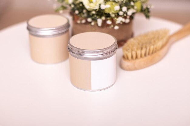 Jars with body scrub an massage brush skin care and treatment product