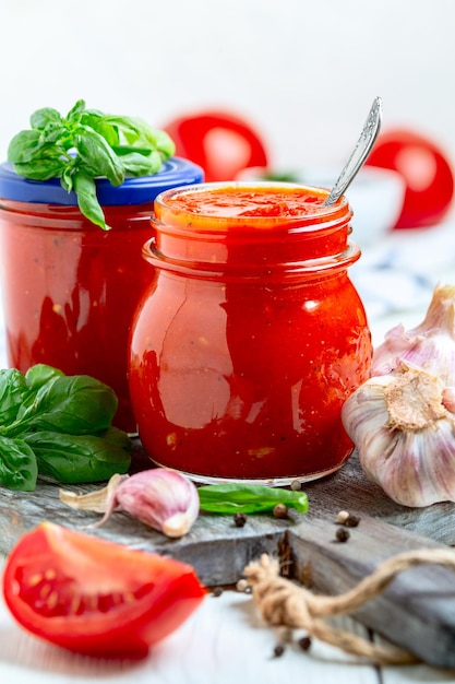 Jars with tomato sauce