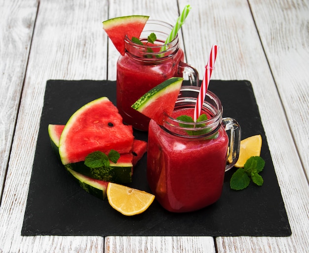 Jars with watermelon smoothie