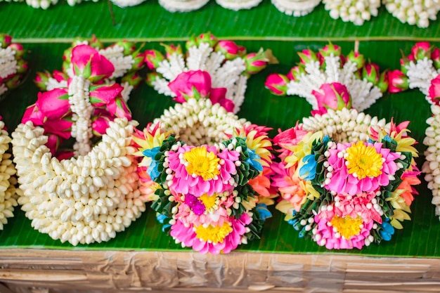 Jasmine rose garland, steering wheel of jasmine flower at street market in thailand.