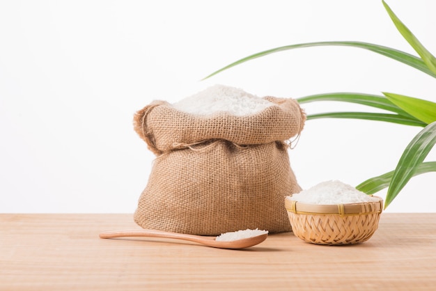 Jasmine white rice in sack isolated on white background