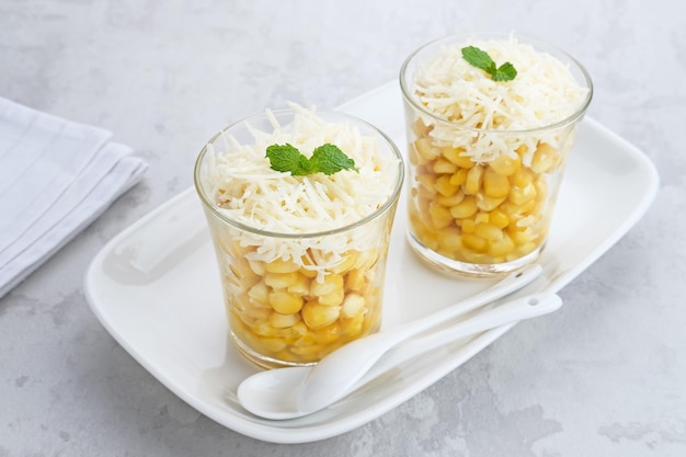 Jasuke Jagung Susu Keju traditional Indonesian snack steamed sweet corn mixed with milk cheese