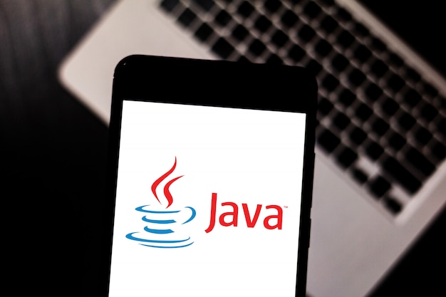 Java logo is displayed on a smartphone.