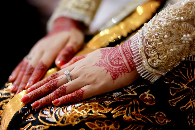 Javanese Bride's Using Traditional Beautiful Henna, Kebaya, Batik, And Wedding Ring. 