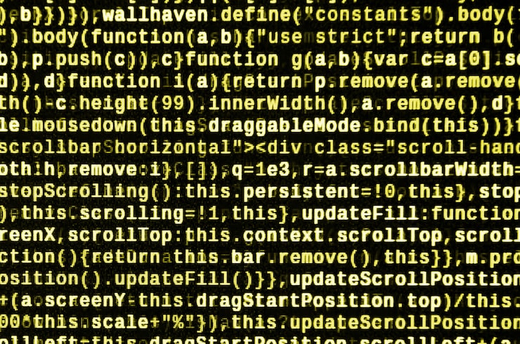 Photo javascript code in text editor. coding cyberspace concept. screen of web developing code