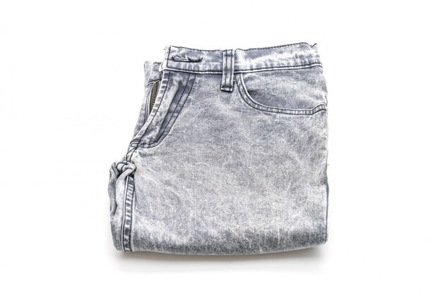 jeans folded on white background