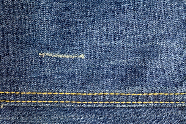 Jeans gescheurd denim textuur oppervlak.