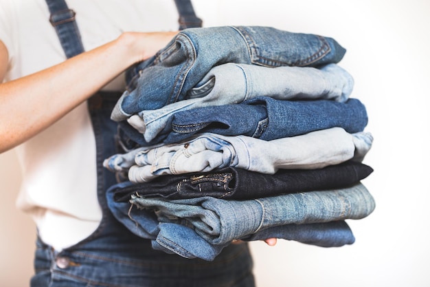 Jeans in her hands