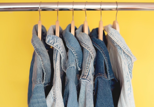 Jeans jackets and retro shirts on second hand market flea market