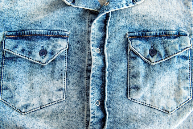 Jeans overhemd textuur achtergrond jeans overhemd knopen en zak