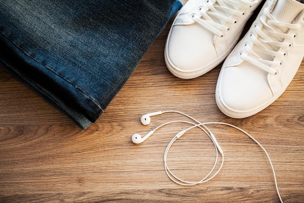 Jeans and sneakers on the store shelf