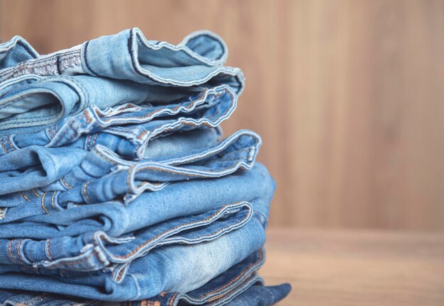 Jeans on the wooden background