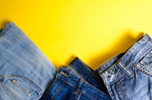 Jeans on a yellow background