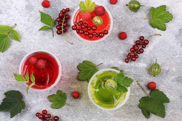 Jelly pudding with berries in glasses