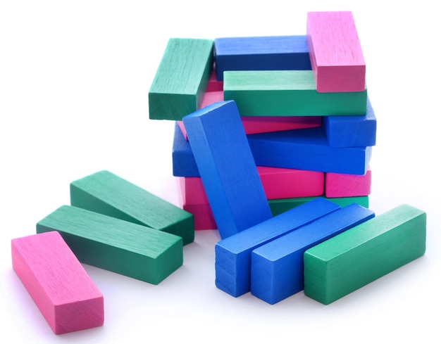 Jenga building of colorful wooden blocks