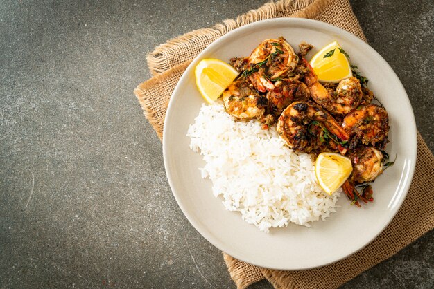 jerk shrimps or grilled shrimps in Jamaica style with lemon and rice