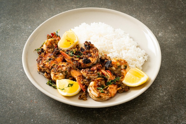 Jerk shrimps or grilled shrimps in Jamaica style with rice