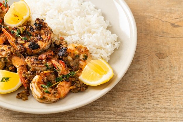 Jerk shrimps or grilled shrimps in Jamaica style with rice