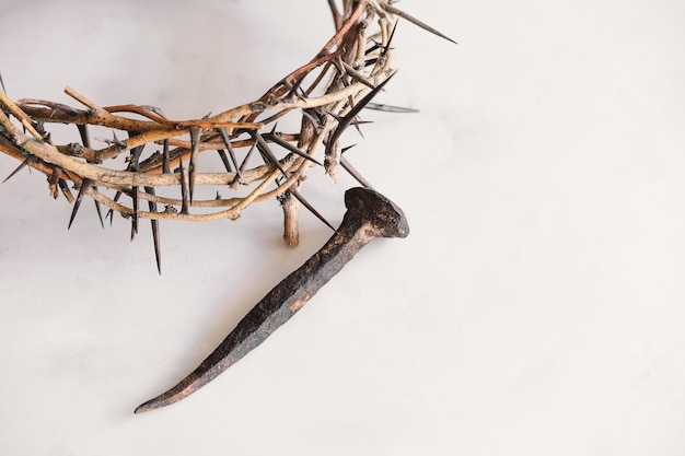 Jesus Crown Thorns and nails and cross on a white background Crucifixion Of Jesus Christ Passion Of Jesus Christ Concept for faith spirituality and religion Easter Day