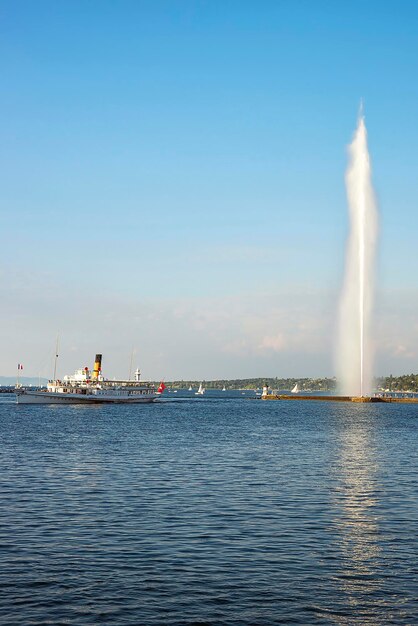 Jet d aeu fountain and a ship in Switzerland in summertime