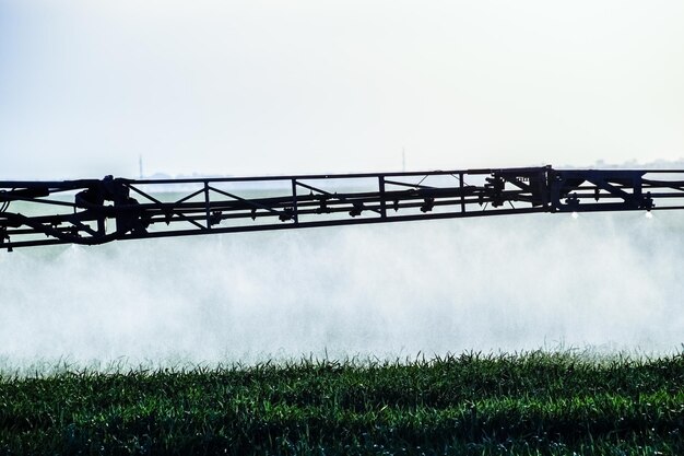 Photo jets of liquid fertilizer from the tractor sprayer