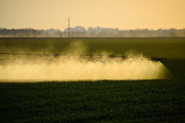 Photo jets of liquid fertilizer from the tractor sprayer