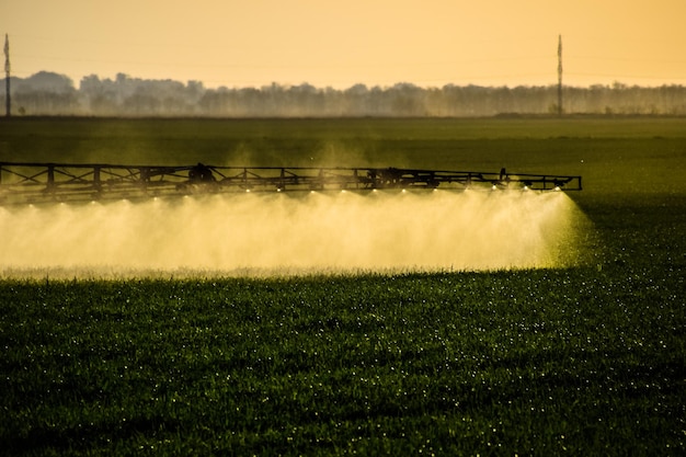 Photo jets of liquid fertilizer from the tractor sprayer