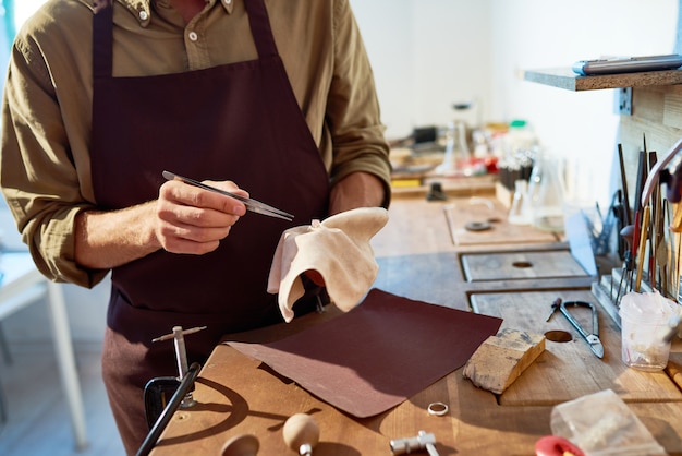 Jeweller Making Silver Ring