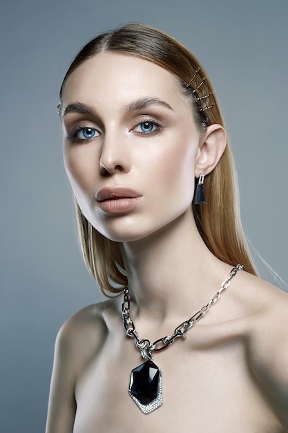 Jewelry on beautiful girl young blonde woman