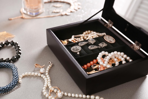 Jewelry and box on table