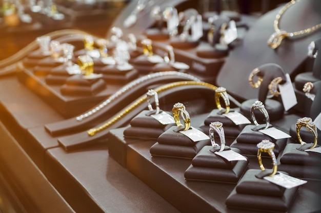 Photo jewelry diamond rings show in luxury retail store window display showcase